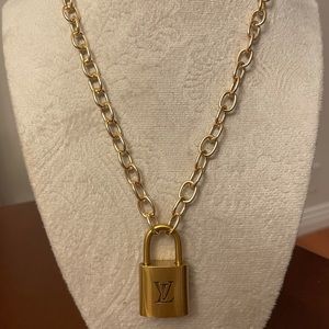 Repurposed authentic Louis Vuitton lock necklace